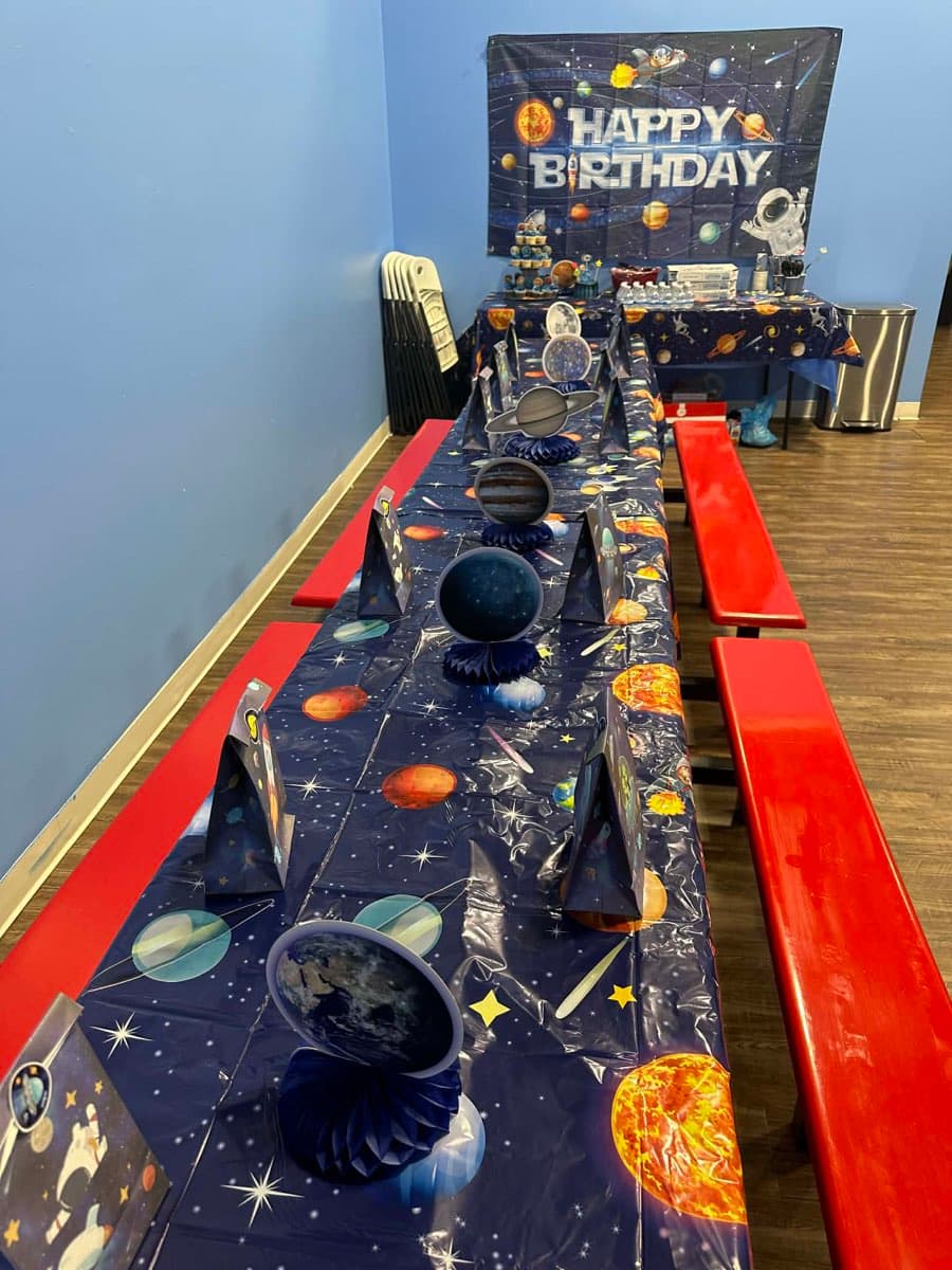 Space-themed birthday table setup