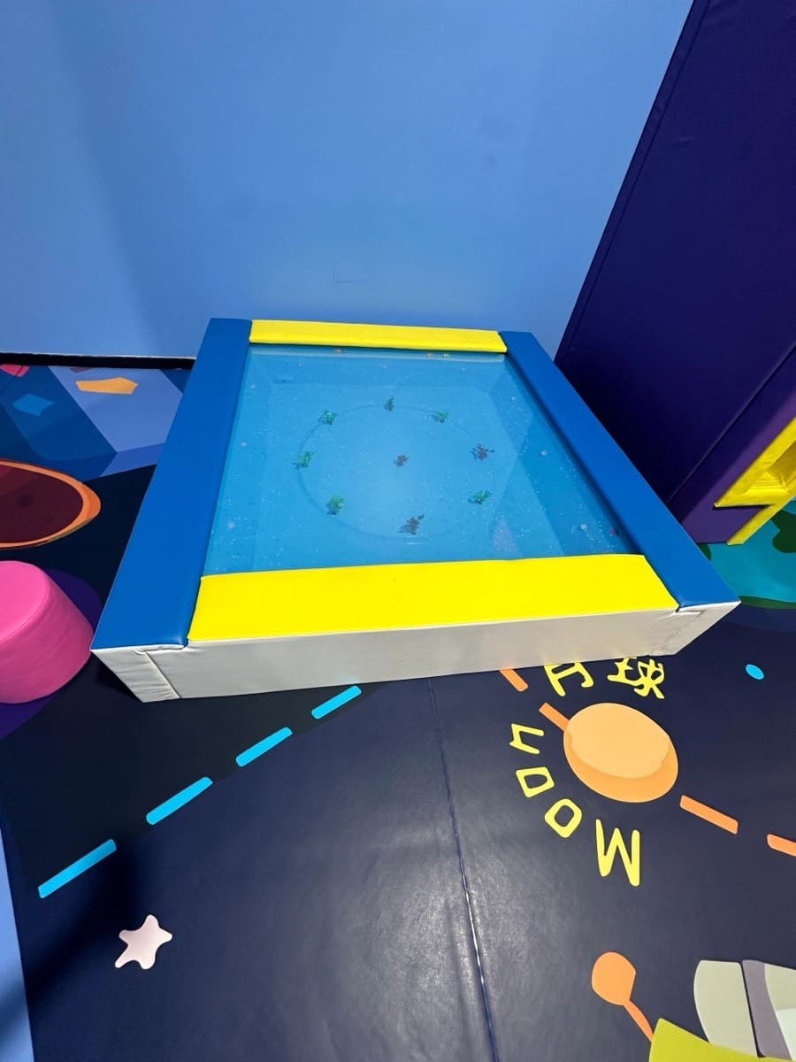 Space-themed soft play and sensory area at Brooklyn