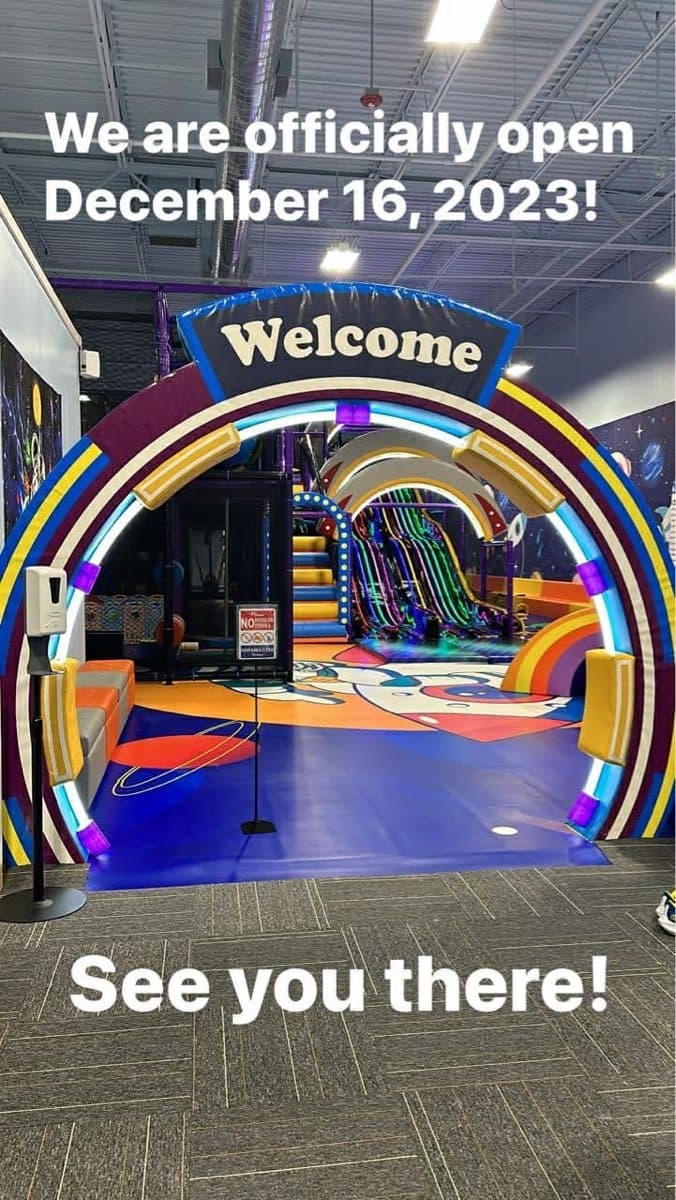 Rainbow LED archway entrance with Welcome sign at Sheffield Village