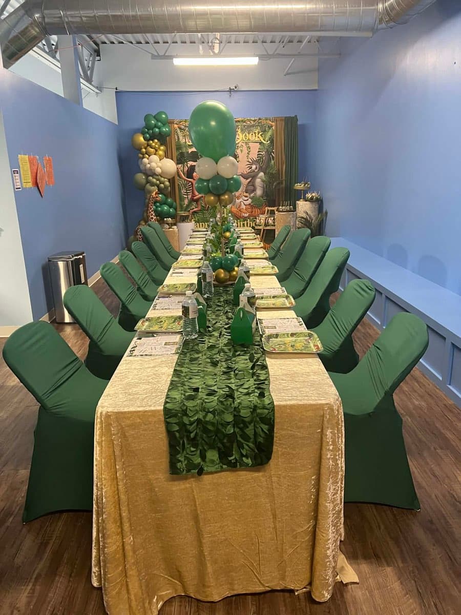 Safari themed birthday party with green chairs at Sheffield Village